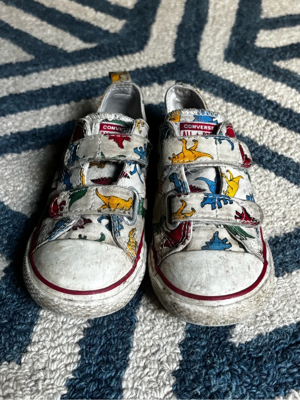 Converse Kids White Canvas Sneakers with Red, Blue, Green, Yellow Dinosaur Print